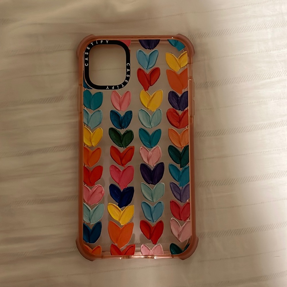 An iPhone 11, Casetify case.